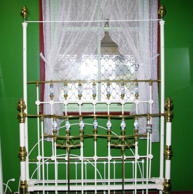 Restored brass and iron beds