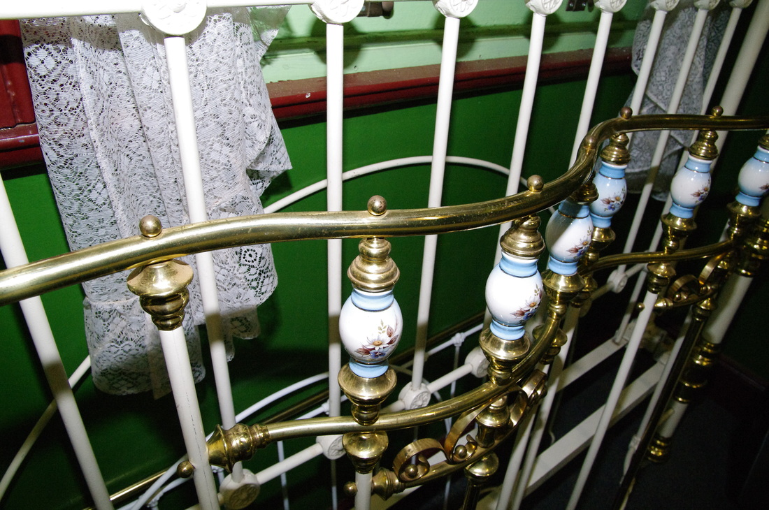 Restored brass and iron beds